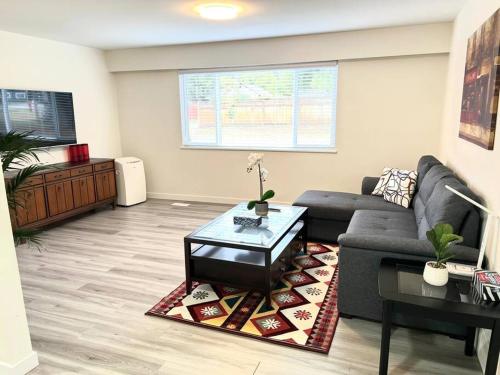 Skytrain 2BR Reno'd ground level fullsuite near Coquitlam Center