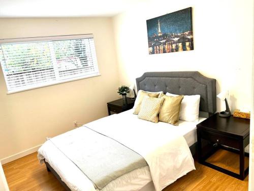 Skytrain 2BR Reno'd ground level fullsuite near Coquitlam Center