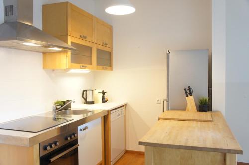 廚房, Schwarzacherhof Pension & Apartments in 聖維伊恩蓬高