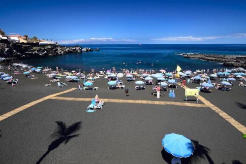 Neptuno “Playa De Arenas” beach - Tap to explore photos