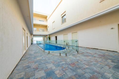 Swimming pool, INDIUM SUITES Durrat AlArus for families only in Durrat Al-Arus