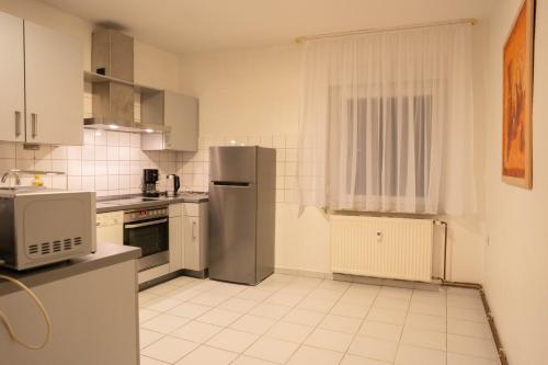 Kitchen, Haus Kim Thinh in Betzdorf