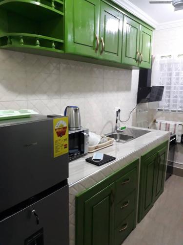 bucătărie, Dollys Villagio Apartments in Takoradi