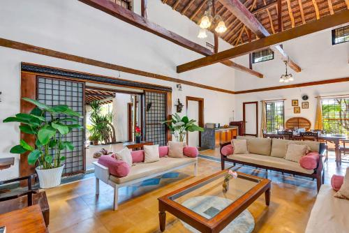 Exterior view of SaffronStays Laburnum House - 3BHK Pet-Friendly Villa with Pool, Lawn & Countryside Views