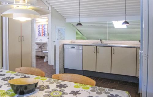 Kitchen, Cozy Apartment In Allinge With Kitchen in Slotslyngvej