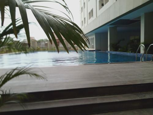 สระว่ายน้ำ, De Green Inn Serua in จิปูตัต