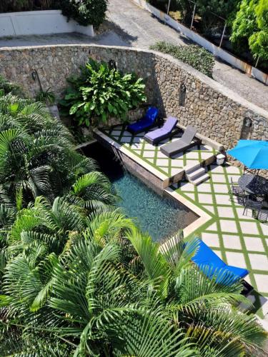 Swimming pool, OASIS Penthouse with private garden & shared pool in Indigo Bay