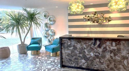 Acellyne's Suites at The Residences at Commonwealth by Century