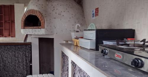 Kitchen, Unique Owl Apartments in Sanyang