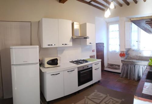 кухня, Appartamento La Torretta in Поркарі