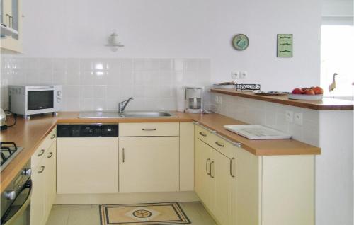 Kitchen, Awesome Home In Quemper Guezennec in Pontrieux