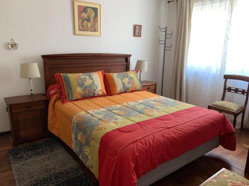 Three-Bedroom Apartment room in Departamento acogedor céntrico y tranquilo