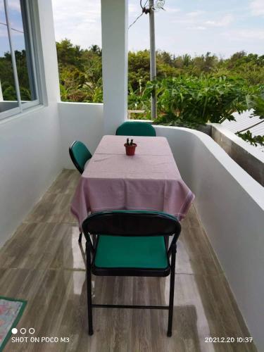 Balcony/terrace, Couple room in Paradise inn Resort in Patar Beach