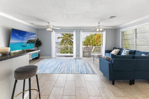 Oceanfront villa with private beach, heated pool, tiki and boat dock