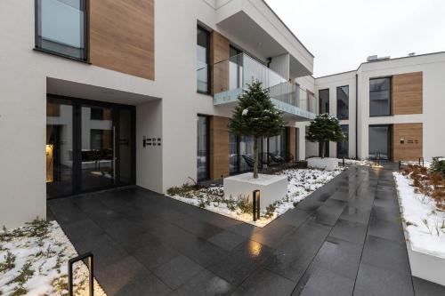 酒店外观, Apartamenty Olimpijska nad jeziorem Ukiel in 奥尔士廷