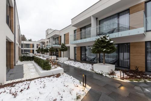 酒店外观, Apartamenty Olimpijska nad jeziorem Ukiel in 奥尔士廷
