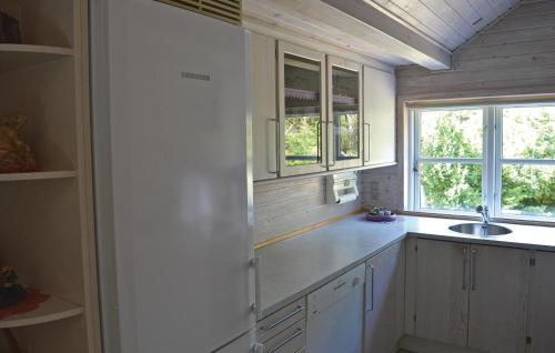 Kitchen, Holiday Home A Hveyselsvej With Shower And Fireplace in Osterby