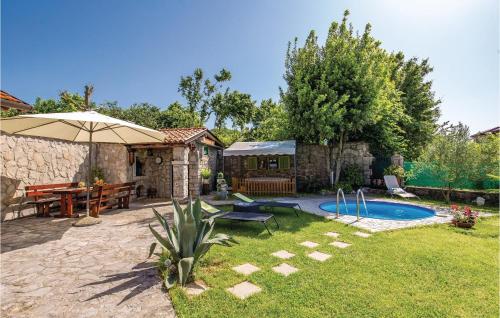  Amazing home in Jurdani with 2 Bedrooms, WiFi and Outdoor swimming pool in Jušići