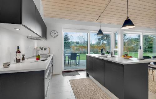 Kitchen, Three-Bedroom Holiday Home In Vaggerlose in Idestrup