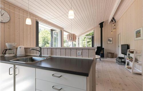 Amazing Home In Aakirkeby With Kitchen