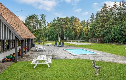 Lovely Home In Nex With Outdoor Swimming Pool