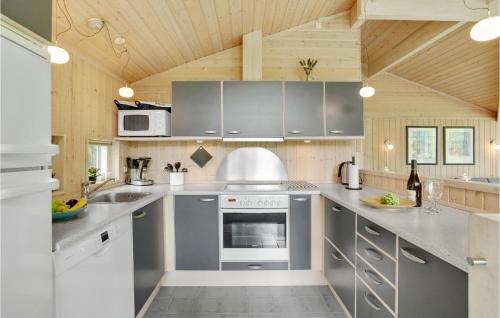 Kitchen, Holiday Home Soløjevej in Vaeggerlose