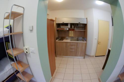 Kitchen, Il Villaggio di ABITABO in San Donato