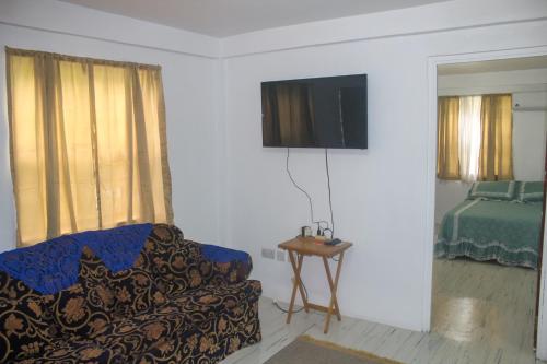 Shared lounge/TV area, Comfort Air B & B in St Georges