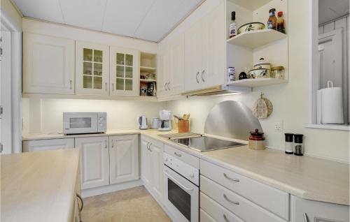 Kitchen, Holiday Home Skovlindvej Iii in Vaeggerlose