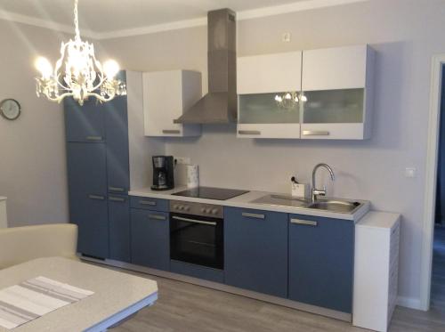 ห้องครัว, Kleine Villa Marleen, Ferienwohnung in ชเนเฟอร์ดินเกน