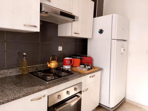 Facilities, Charite Host Appartement , Wifi et Parking Gratuit in Essalam