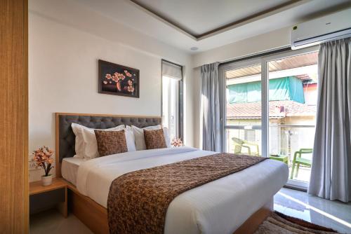 Drizzle Resort with Swimming pool Near Maapro Garden