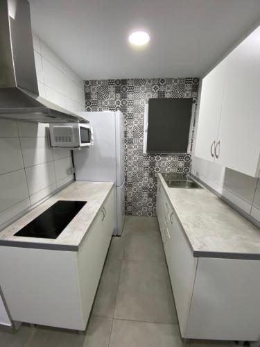 virtuve, APARTAMENTOS PASCUAL in El Cuervo