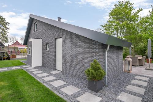  VILLA ARYVE in See-, Strand- und Golfplatznähe inklusive NETFLIX, Bad en Suite und Wohlfühlgarantie in Dirkshorn