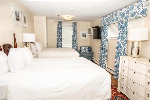 Three Village Inn Room Type - Queen Room with Two Queen Beds