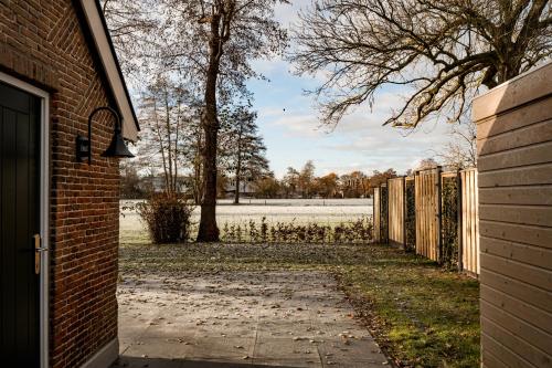 Erkély/terasz, Landelijk gelegen vakantiewoning in Verspreide huizen Oldebroek