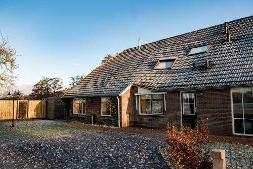 Bejárat, Landelijk gelegen vakantiewoning in Verspreide huizen Oldebroek