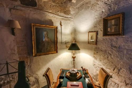 Charming 14th Century Village Chateau with gardens and outdoor pool in Montagrier