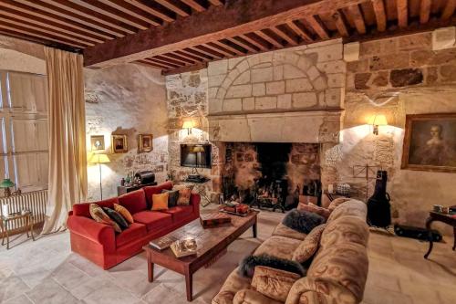 Charming 14th Century Village Chateau with gardens and outdoor pool in Montagrier