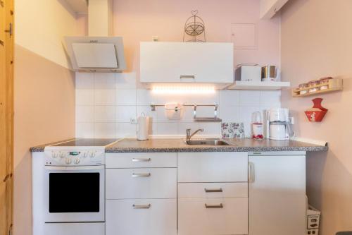 Kitchen, Denkerhof Apartment Rosenquarz in Reussenkoge