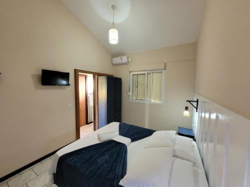 Pousada Genoveva - Apto com um dormitório (Pousada Genoveva - Apto com um dormitorio) in Farol de Santa Marta