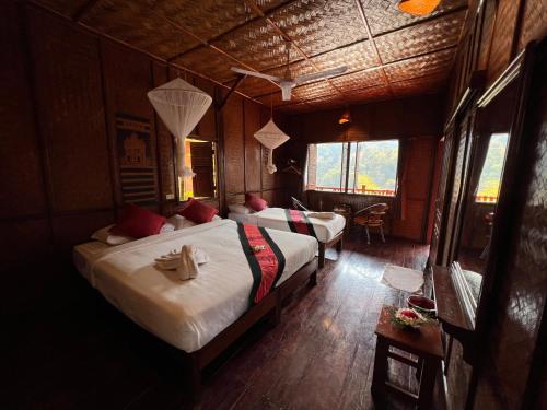 客室, メコン リバーサイド ロッジ (Mekong Riverside Lodge) in パクベン