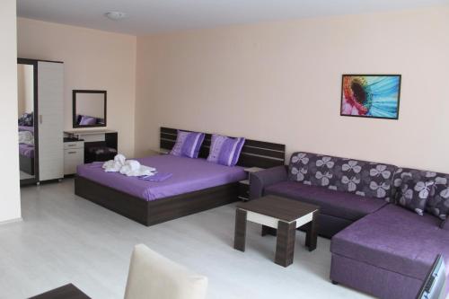 Family Studio with Balcony room in Rose Garden Omax Apartments