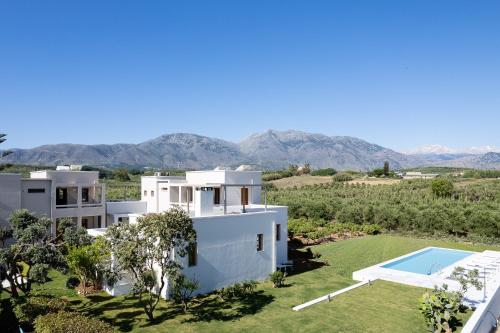 Exterior view, Mikro Livadi Special Lodges - Has an Eco Salt water pool - 150m from the beach in Lappei