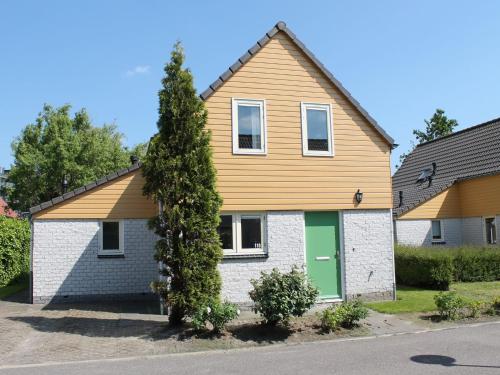 Nice holiday home with sauna on a holiday park, 200m from the beach