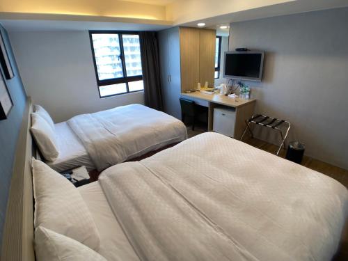 Quadruple Room room in Bonjour Hotel