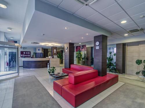 共用Lounge/電視區, 大都會酒店 (Hotel Capital) in 羅維戈