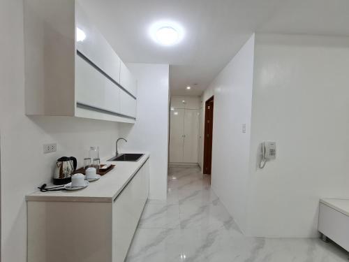 Kitchen, Staycation Hotel in San Jose (Nueva Ecija)