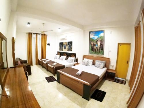 1 double bed, 3 twin beds