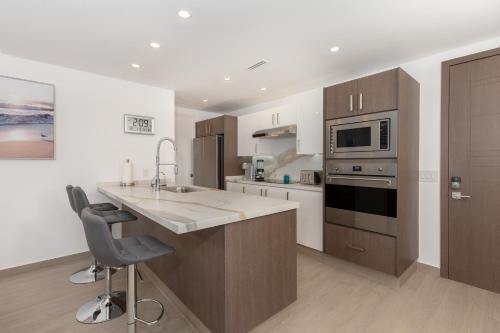 Brand New Contemporary 2 BD Oceanfront Condo at Encantame Towers Verano E302 in Playa Encanto